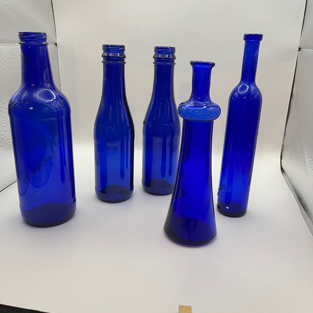 set of 5 COBALT. small bottles